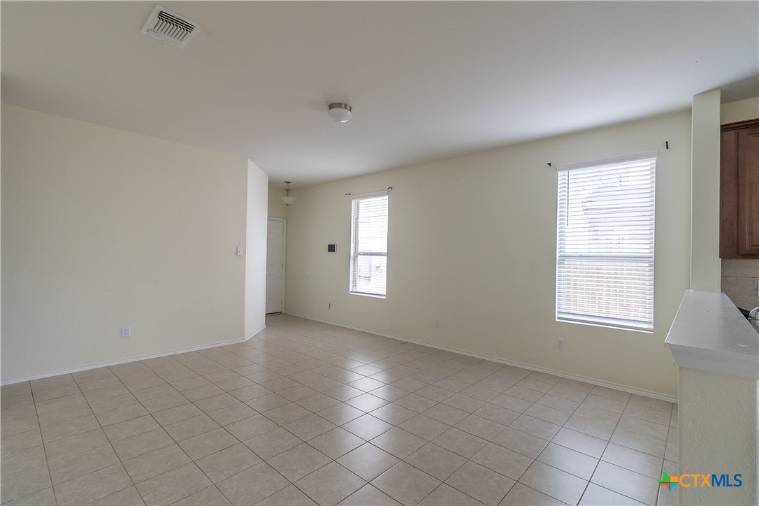 145 Miracle Drive Jarrell, TX 76537 - Photo 7 of 23 an empty room with windows