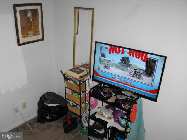 245 Tate Road Prince Frederick, MD 20678 - Photo 12 of 15 a room with lots of different colored cloths