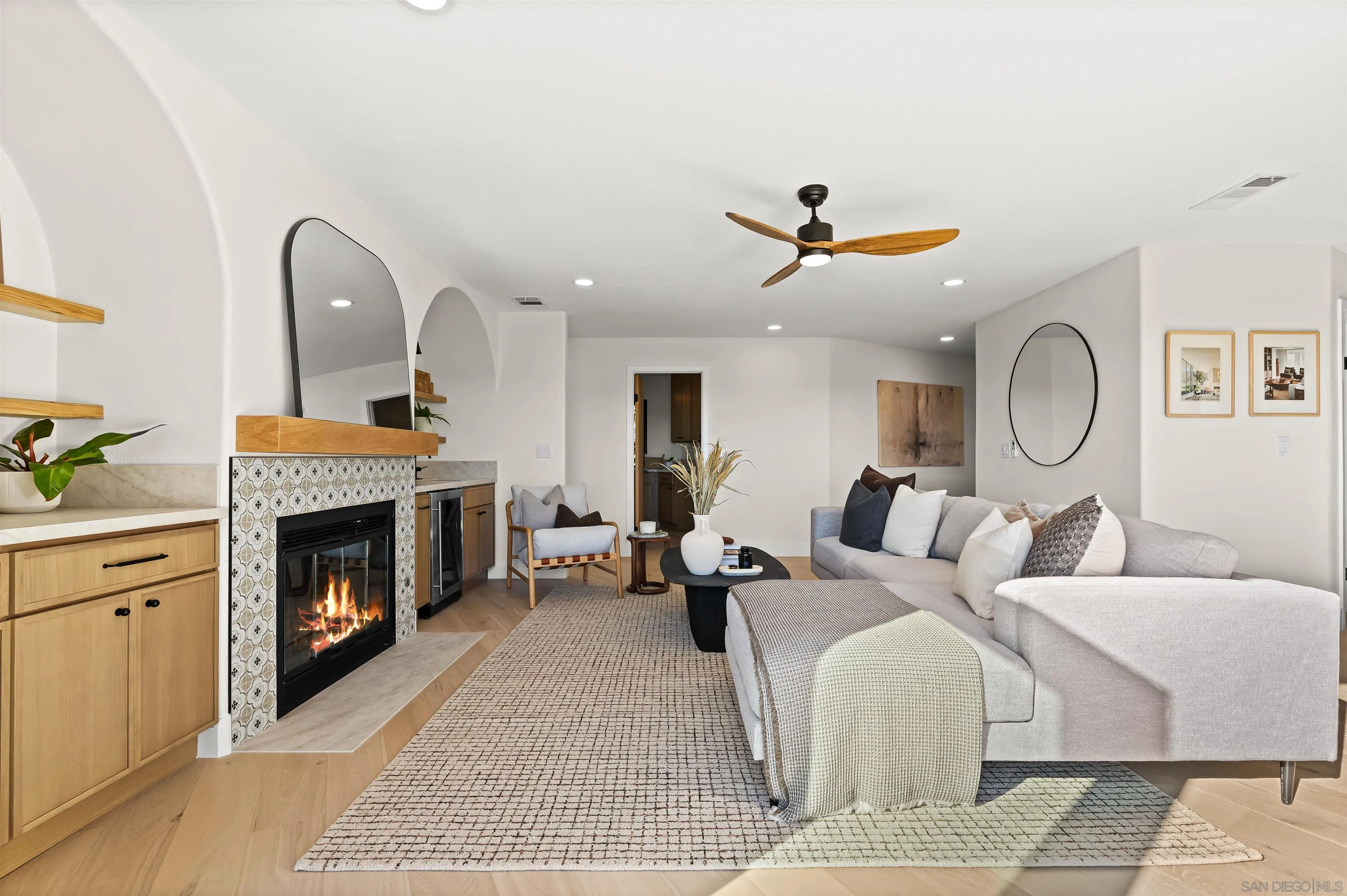 1170 Rancho Encinitas Drive Encinitas, CA 92024 - Photo 29 of 72 a living room with furniture chandelier and a fireplace