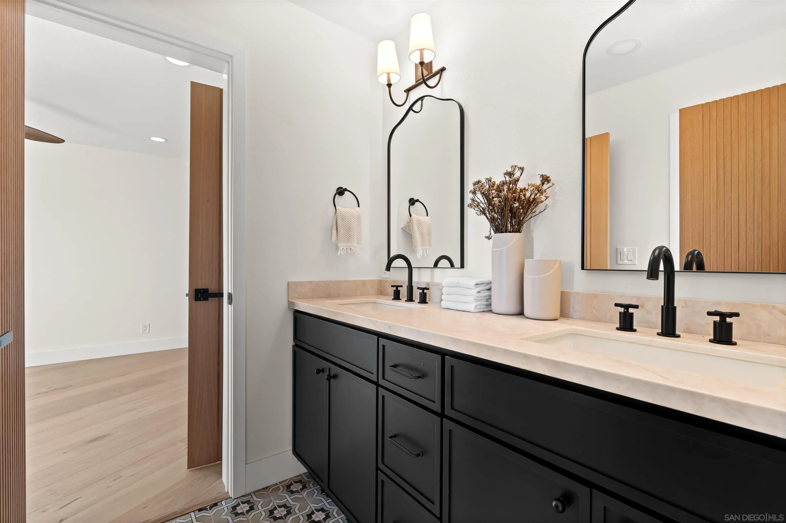 1170 Rancho Encinitas Drive Encinitas, CA 92024 - Photo 46 of 72 a bathroom with a double vanity sink and a mirror