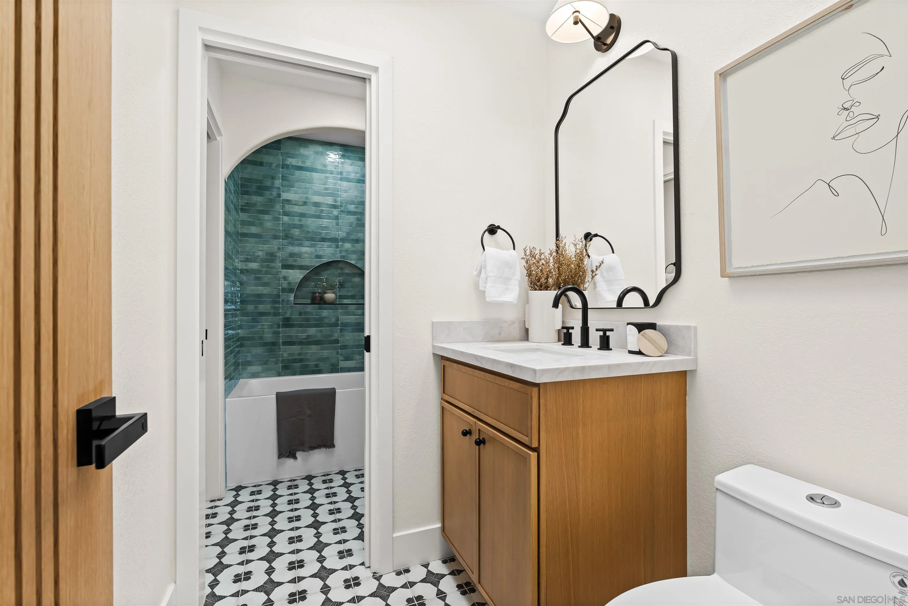 1170 Rancho Encinitas Drive Encinitas, CA 92024 - Photo 49 of 72 a bathroom with a sink a toilet and shower