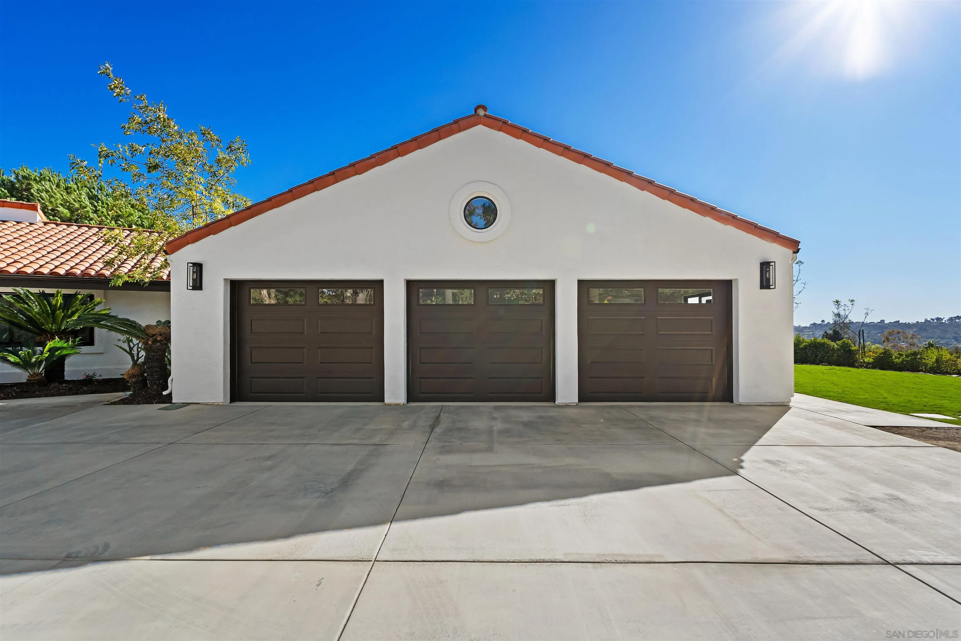 1170 Rancho Encinitas Drive Encinitas, CA 92024 - Photo 56 of 72 a front view of a house with a garage