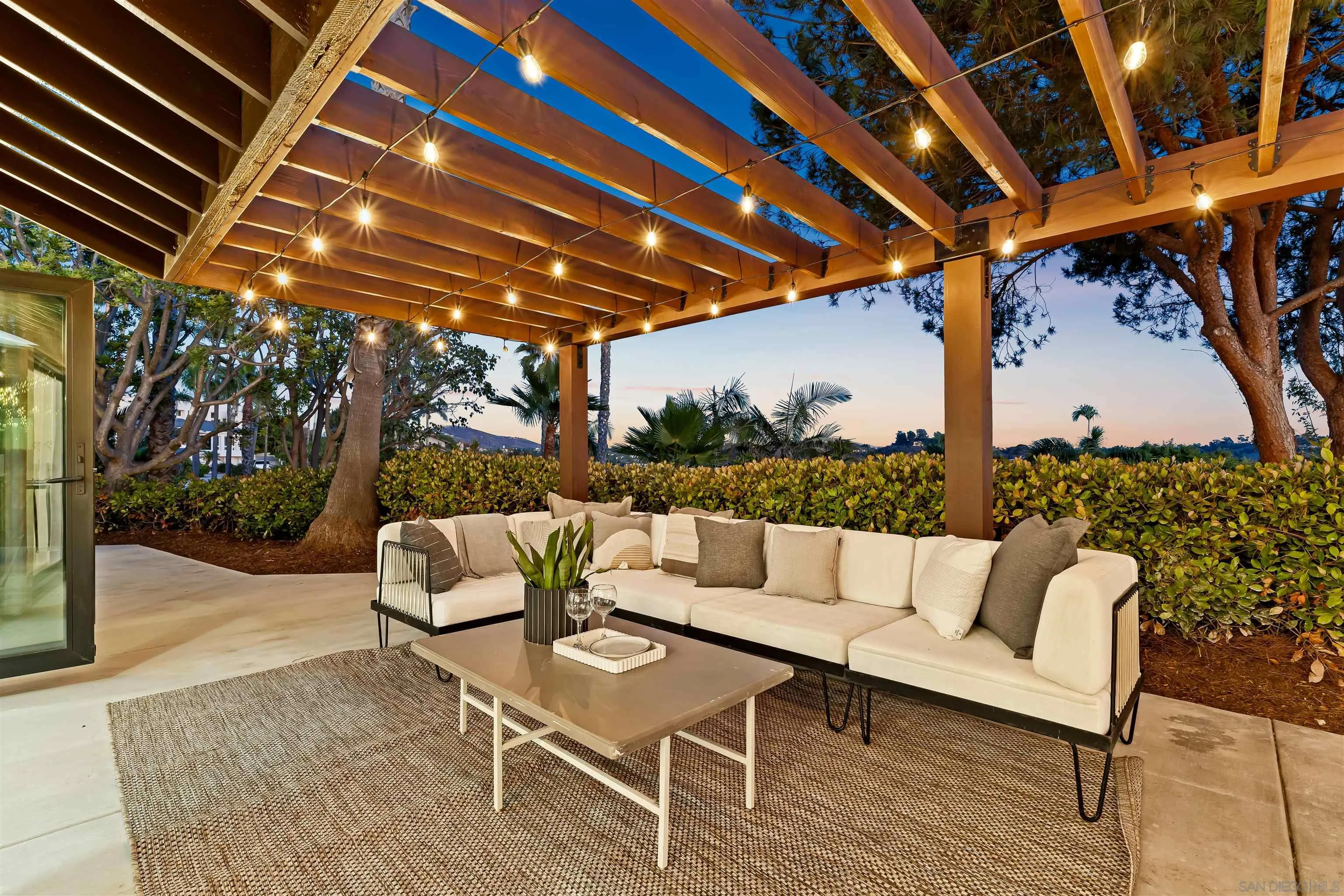 1170 Rancho Encinitas Drive Encinitas, CA 92024 - Photo 59 of 72 a roof deck with couches and wooden fence