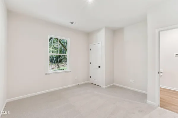 a picture of a bench in a bathroom