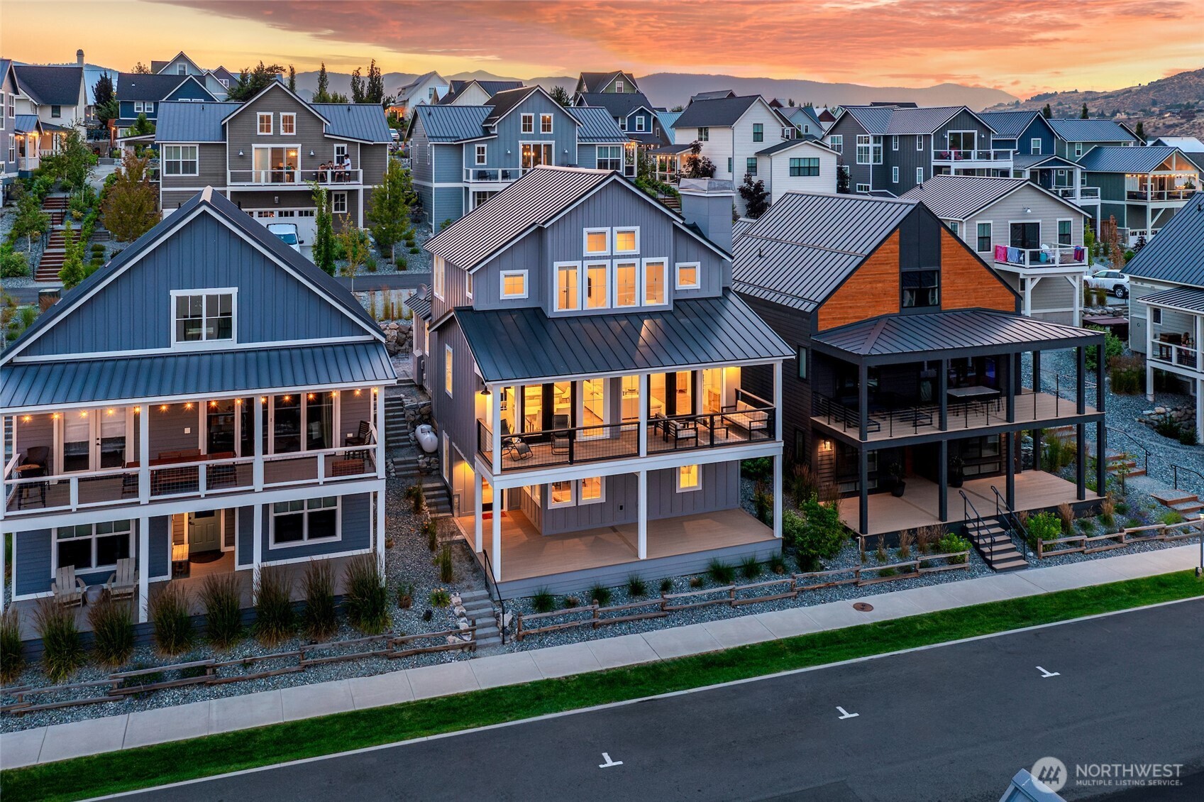 259 Bobcat Lane Chelan, WA 98816 - Photo 1 of 40 a view of multiple houses with a yard