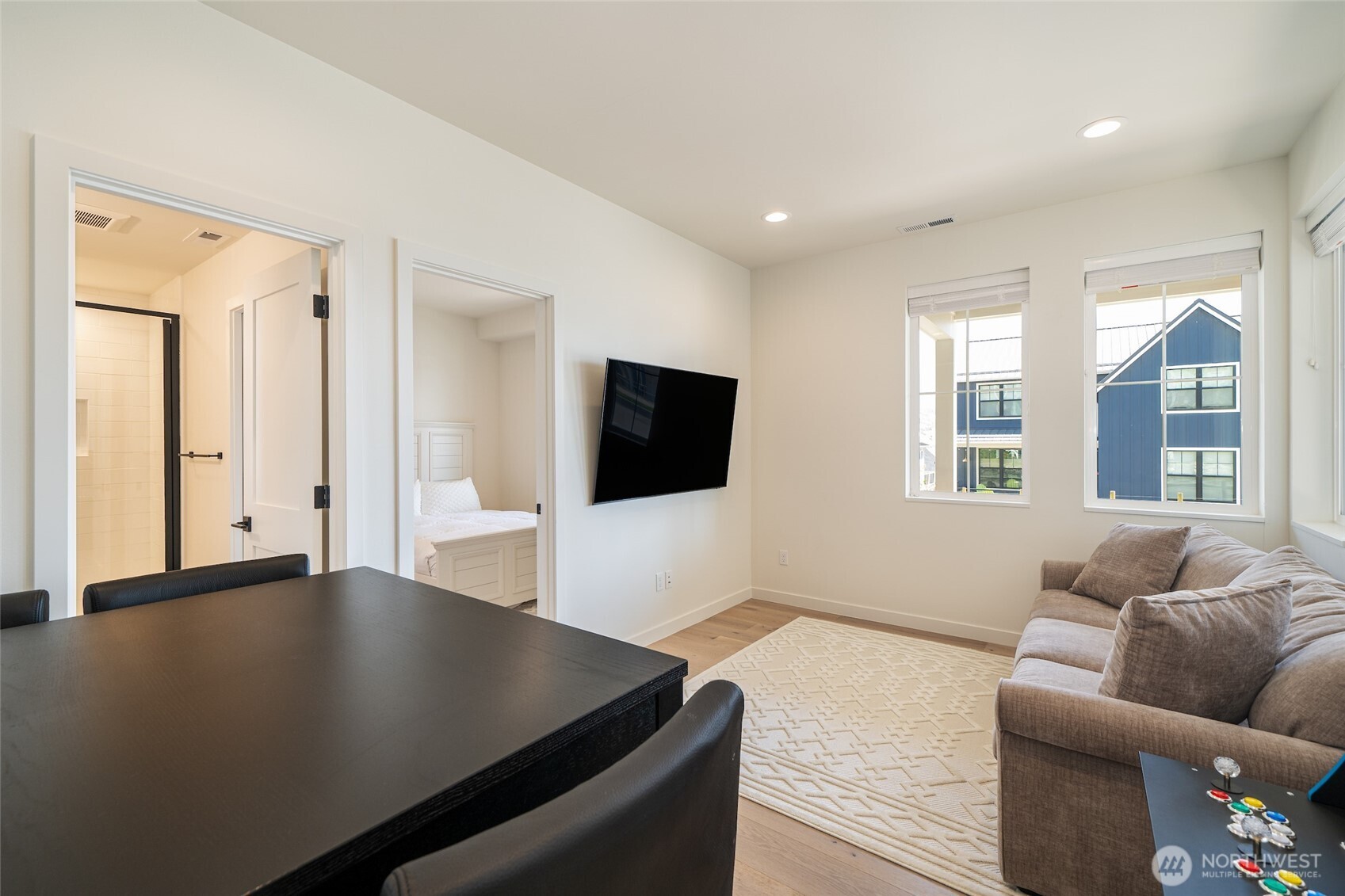 259 Bobcat Lane Chelan, WA 98816 - Photo 19 of 40 a living room with furniture and a flat screen tv