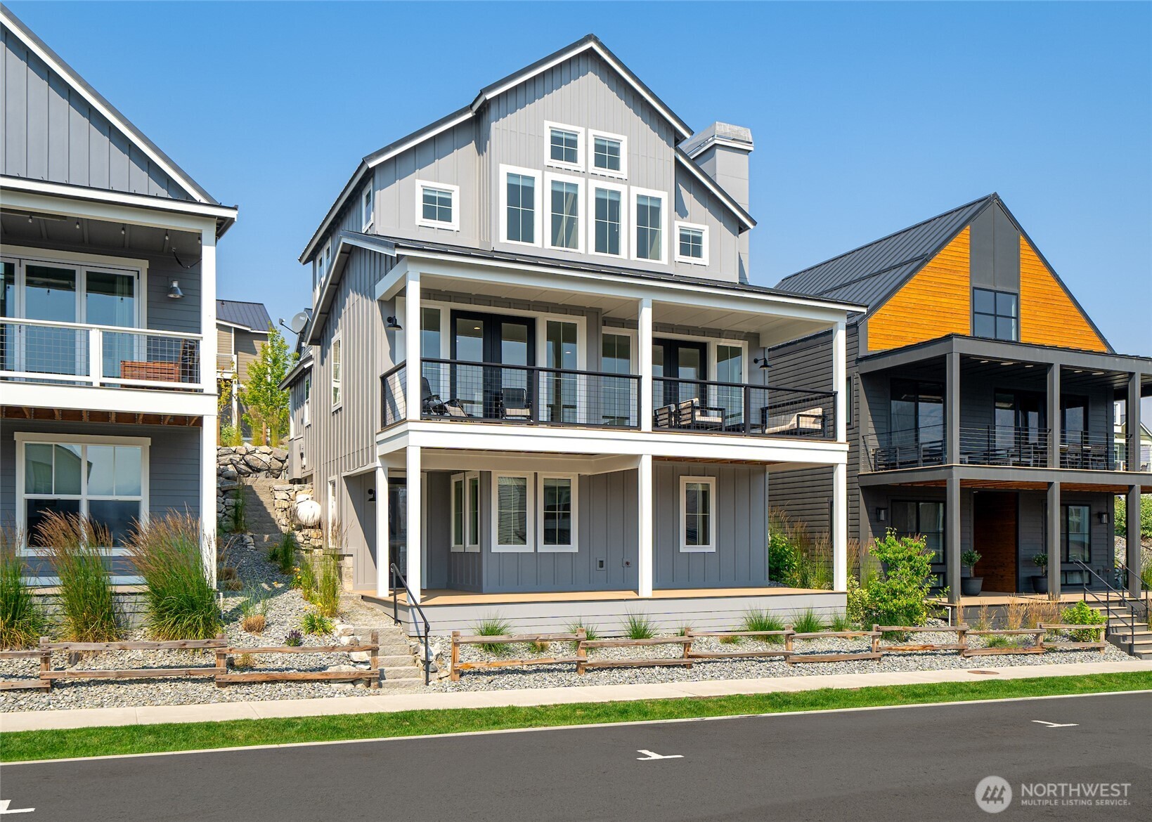 259 Bobcat Lane Chelan, WA 98816 - Photo 6 of 40 a front view of a house with a yard