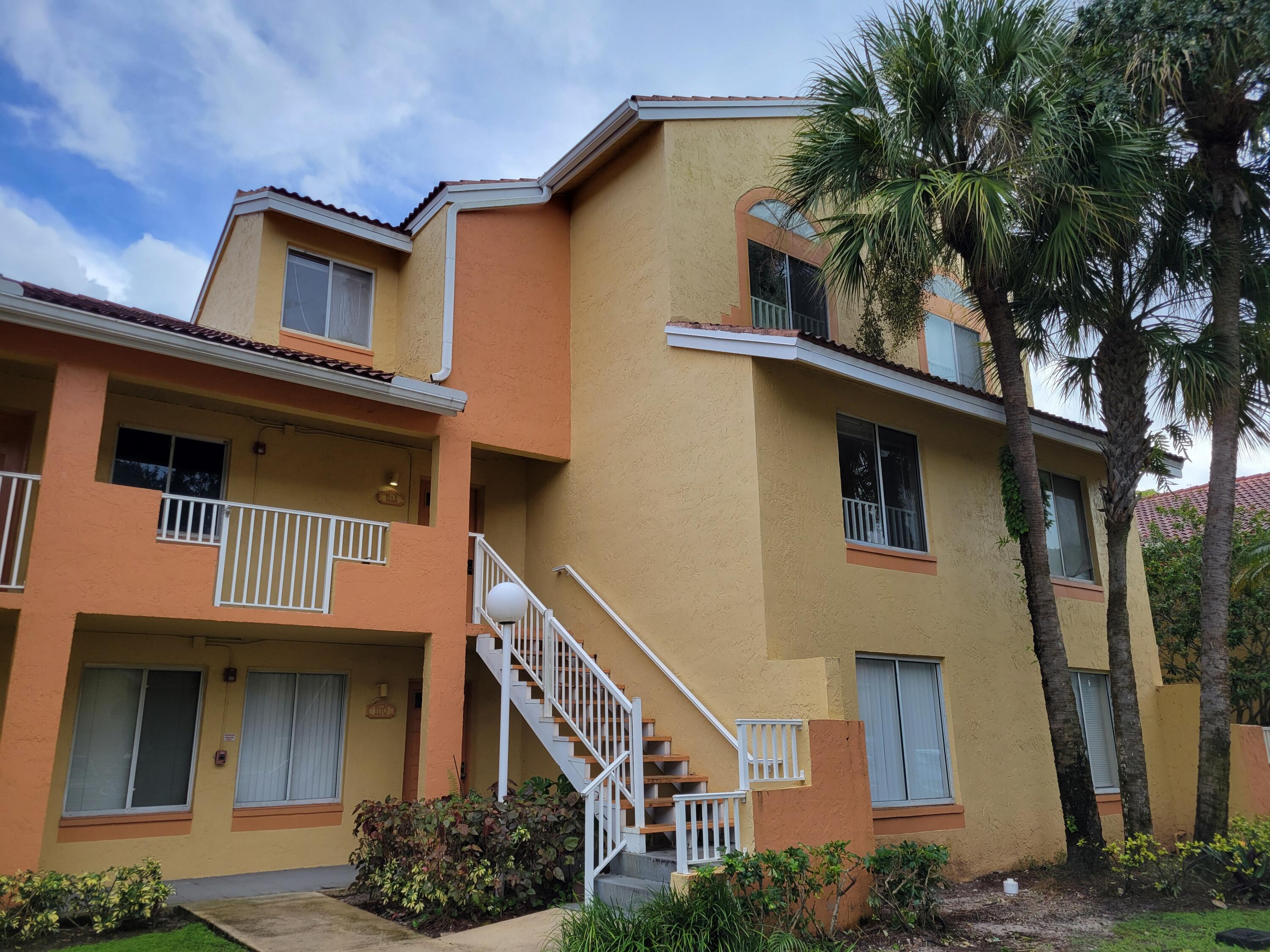 1112 Coral Club Drive, Unit 1112 Coral Springs, FL 33071 - Photo 1 of 16 front view of a house