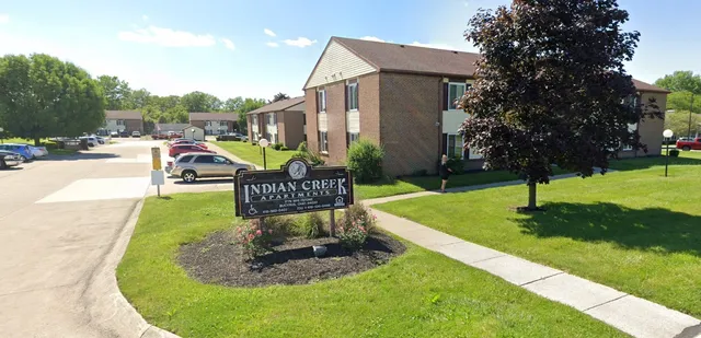 a garden view with a fountain