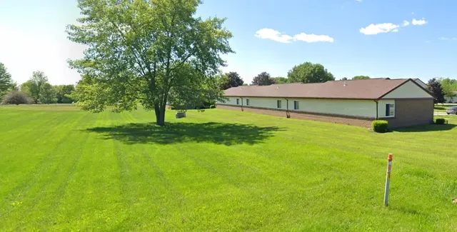 a house view with a garden space