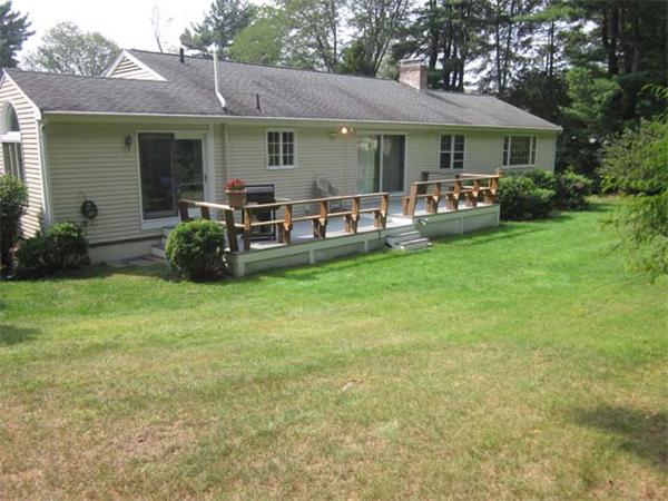 12 Arcadia Road Andover, MA 01810 - Photo 20 of 21 a view of a house with backyard porch and garden