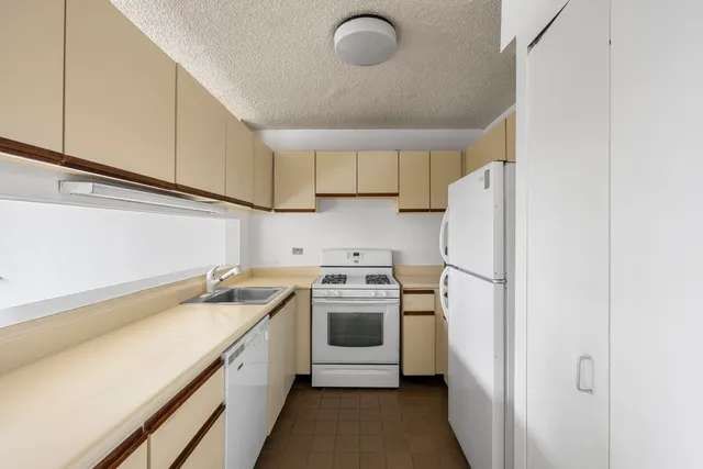 a black and white photo of a living room