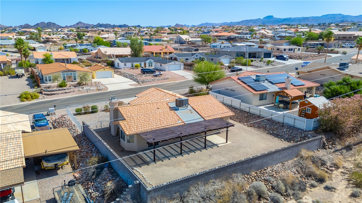 2524 South Ridge Avenue Bullhead City, AZ 86429 - Photo 60 of 64 Aerial perspective of suburban area with mountains