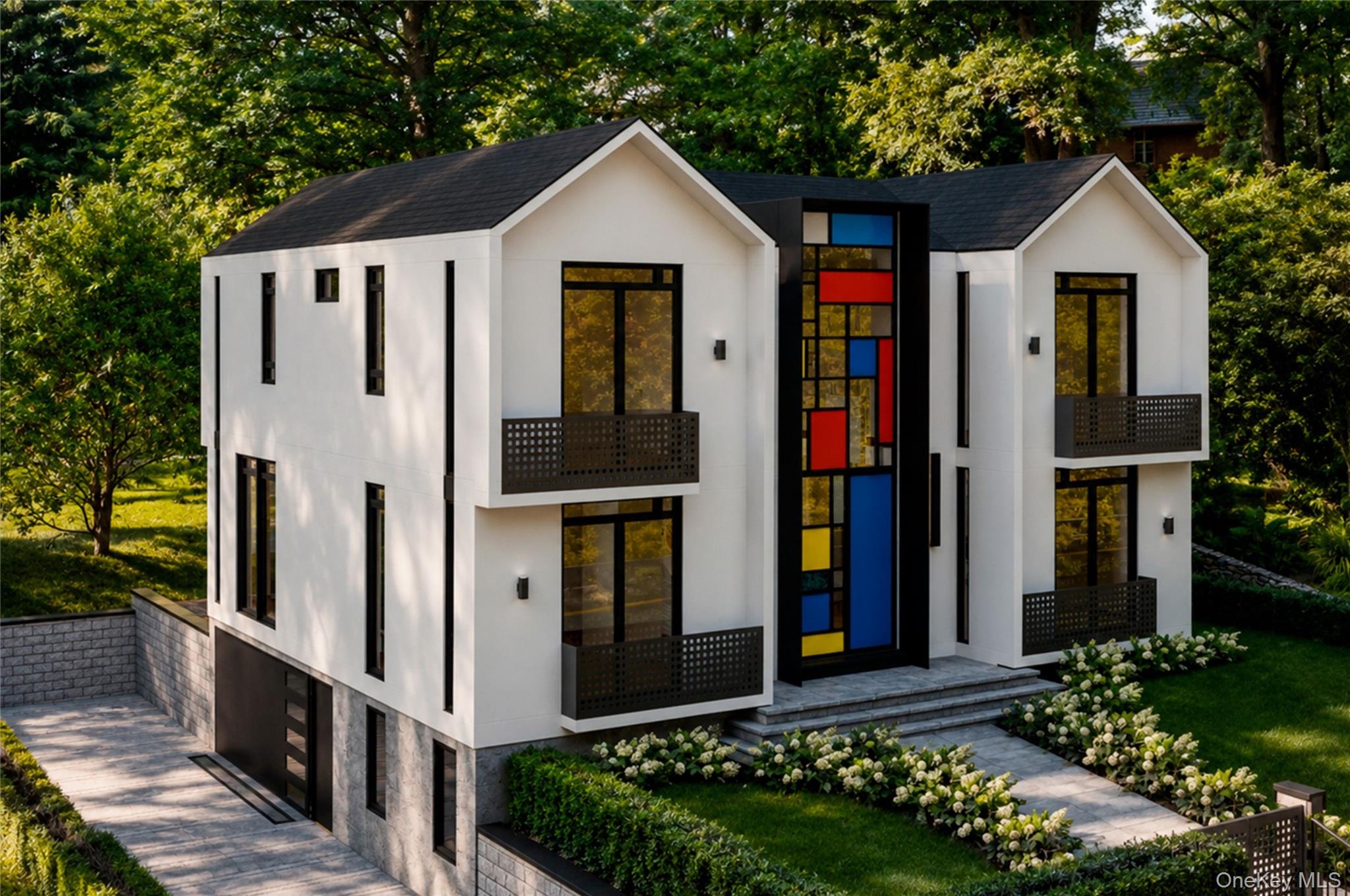 2164 Boston Post Road Larchmont, NY 10538 - Photo 2 of 29 Modern luxury home with an attached two car garage with an extended driveway.