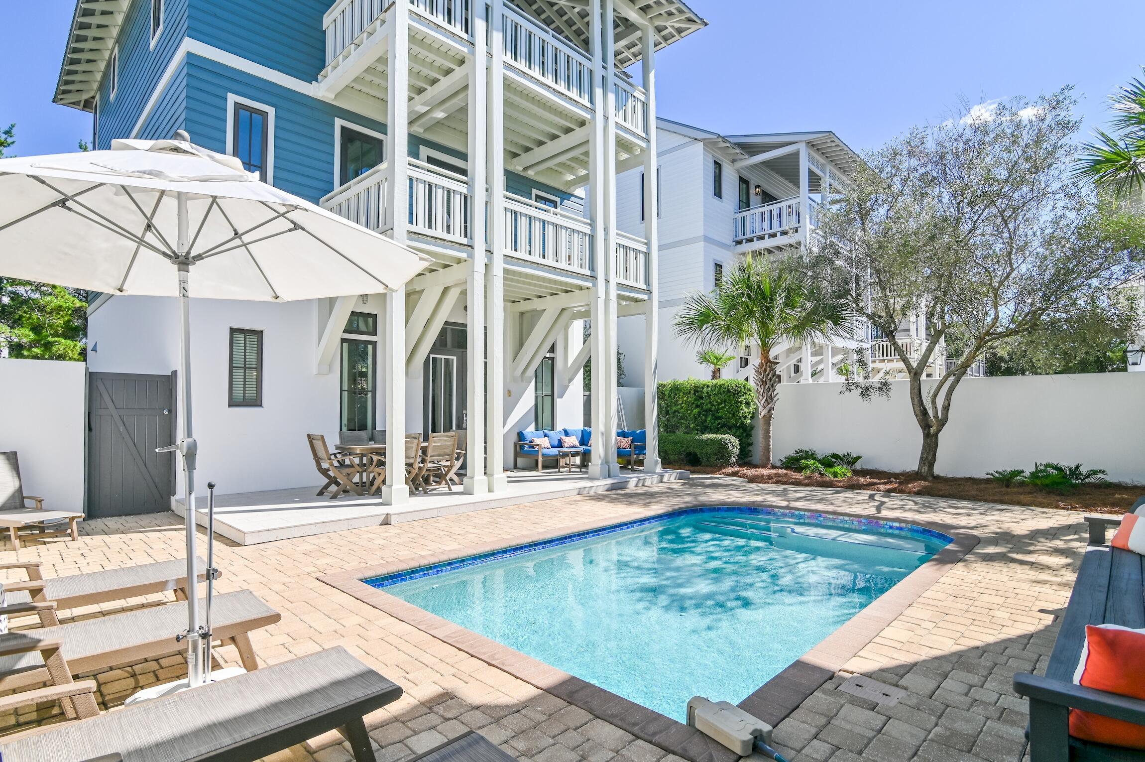 58 North Winston Ln Inlet Beach Inlet Beach, FL 32461 - Photo 1 of 2 a view of a house with palm trees