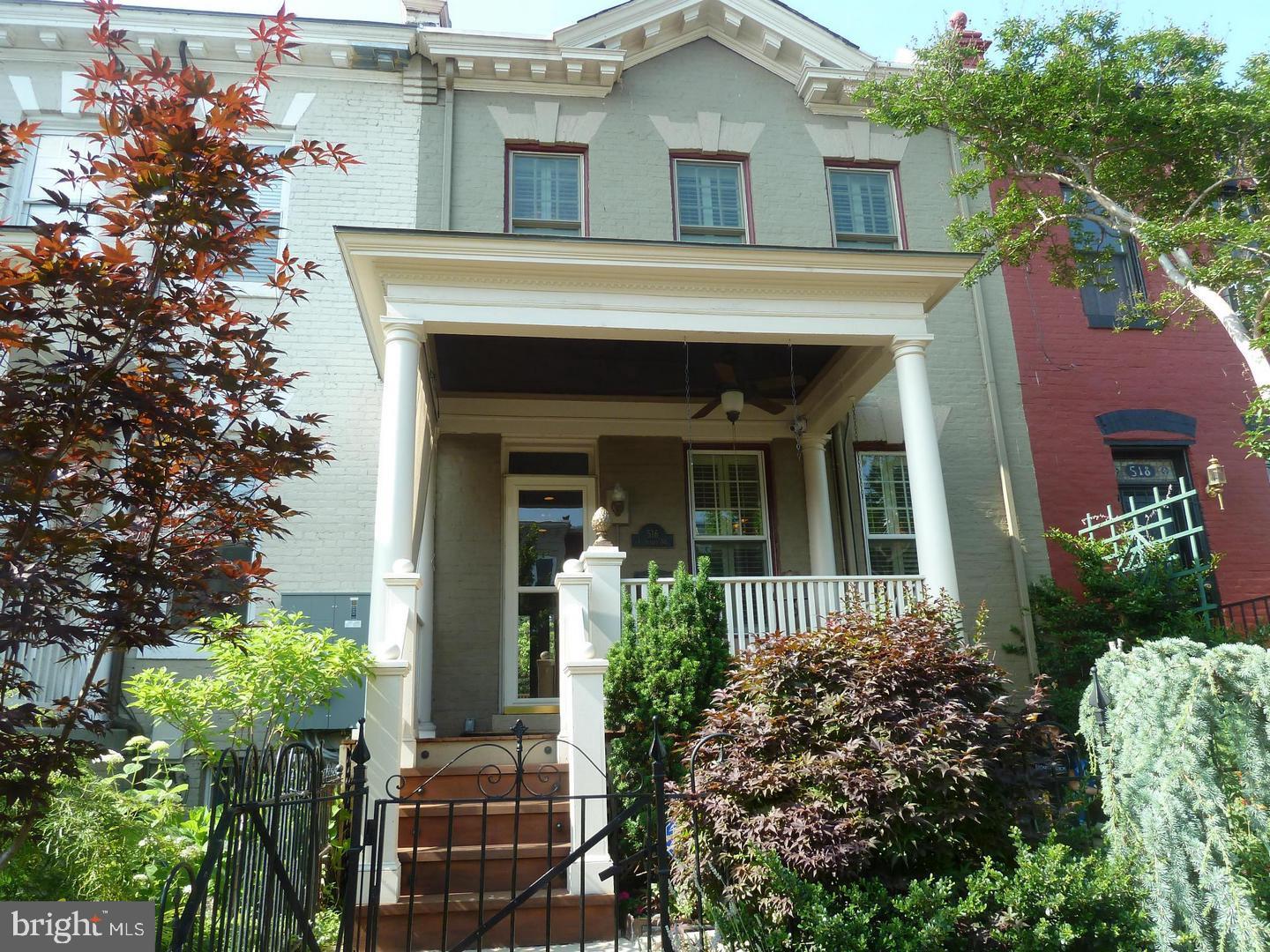 Great curb appeal! Beautiful gate & brick steps
