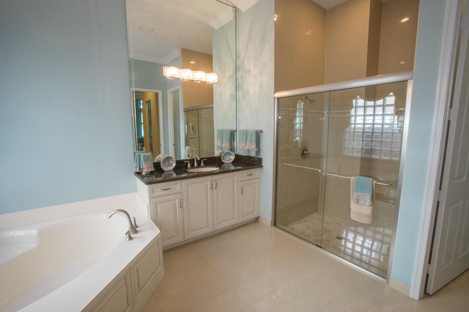 9127 Ribbons Ridge Point Boynton Beach, FL 33473 - Photo 28 of 36 master bath sink 2 shower