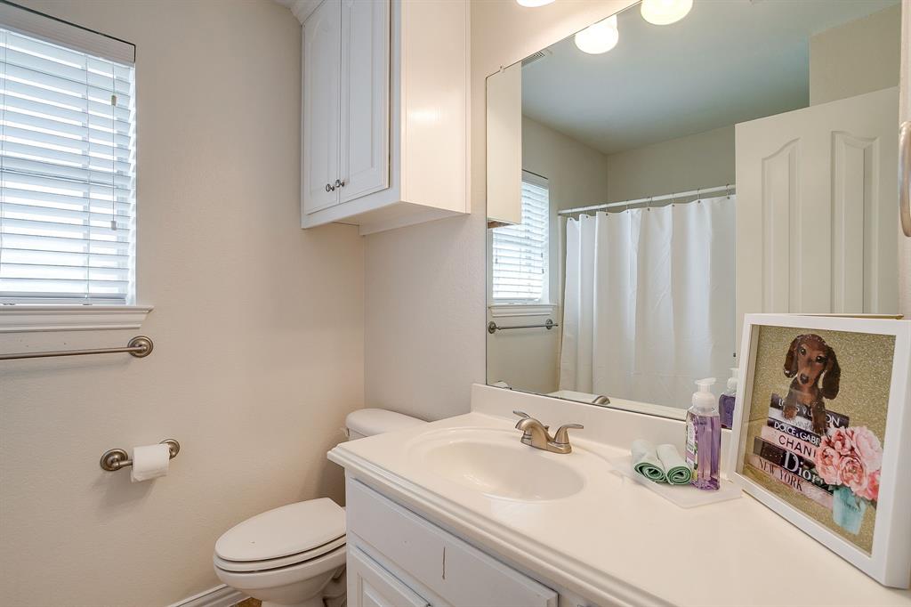 209 Cooperstown Drive Springtown, TX 76082 - Photo 32 of 40 Full bathroom with vanity and a shower with curtain