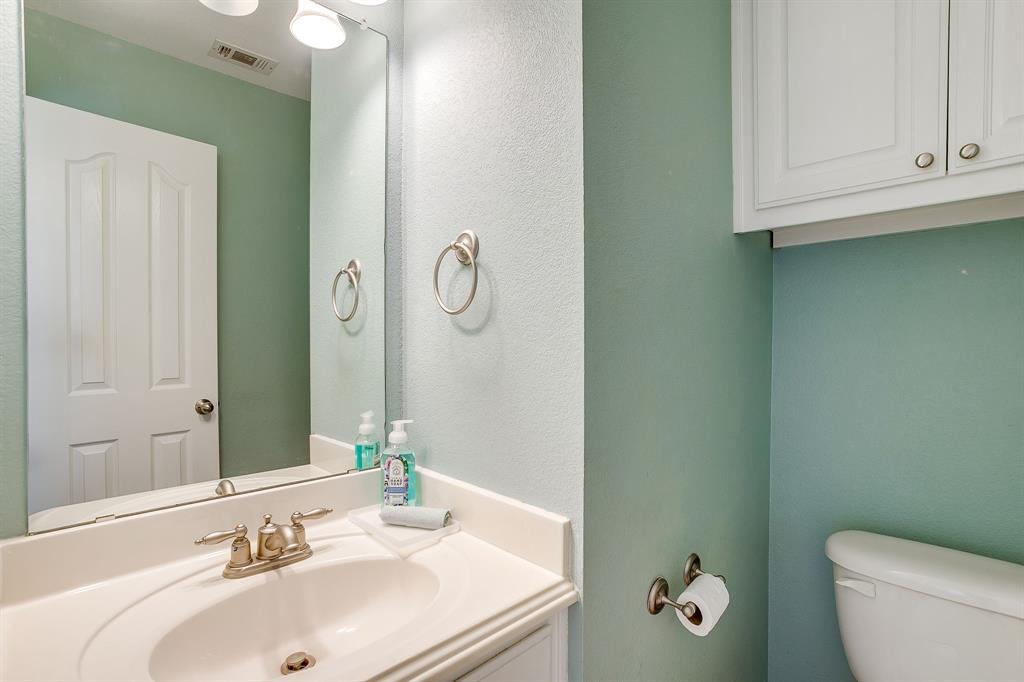 209 Cooperstown Drive Springtown, TX 76082 - Photo 4 of 40 Bathroom with vanity and a textured wall