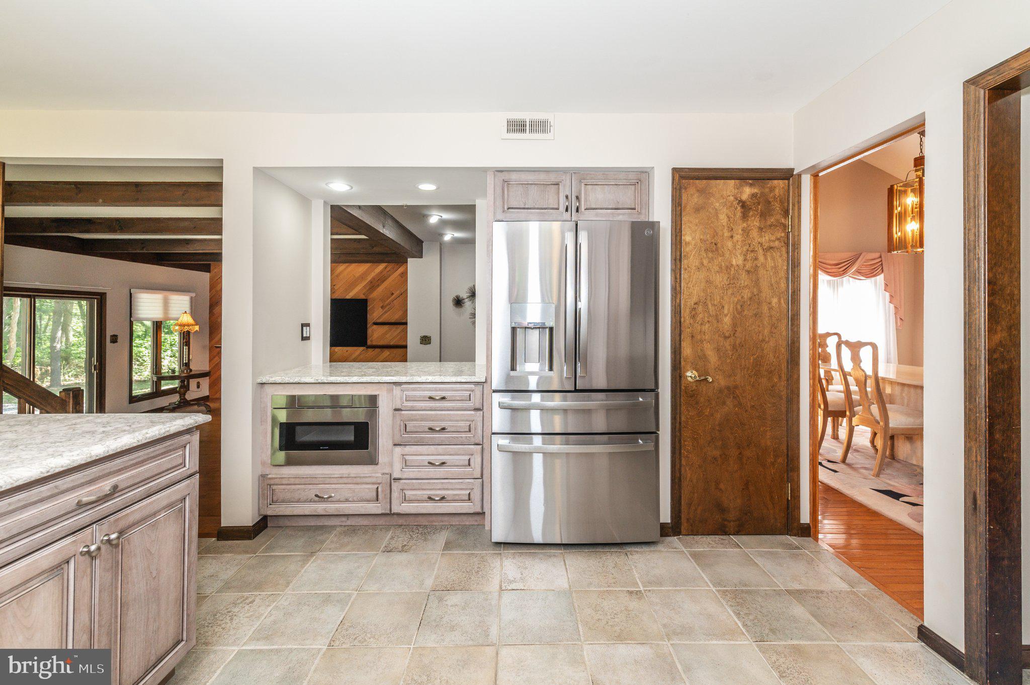 434 4th Street Atco, NJ 08004 - Photo 16 of 69 a kitchen with cabinets and stainless steel appliances