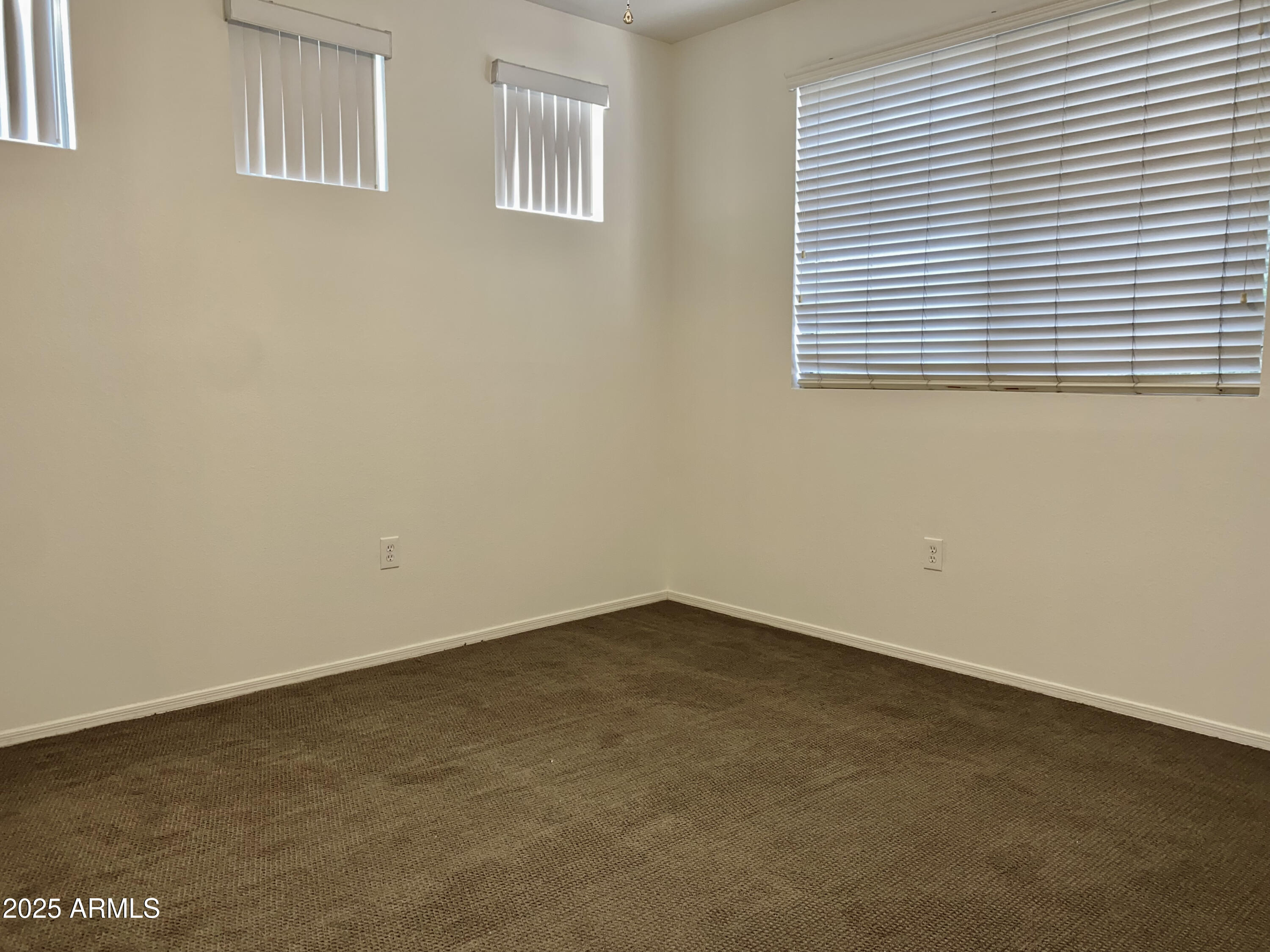 1701 East Colter Street, Unit 1 Phoenix, AZ 85016 - Photo 16 of 17 an empty room with a window