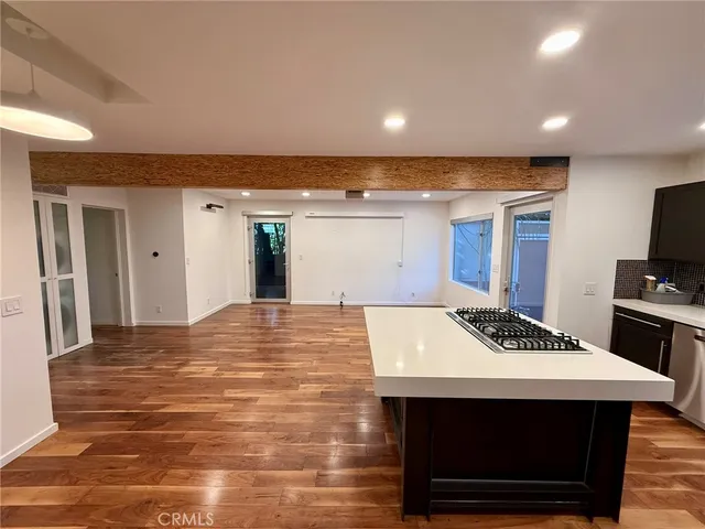 a room with pool table and flat screen tv