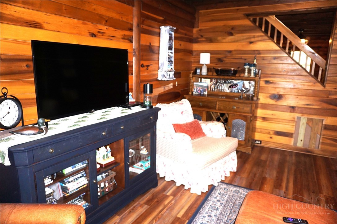 557 White Pine Road Newland, NC 28657 - Photo 5 of 41 a living room with furniture and a flat screen tv