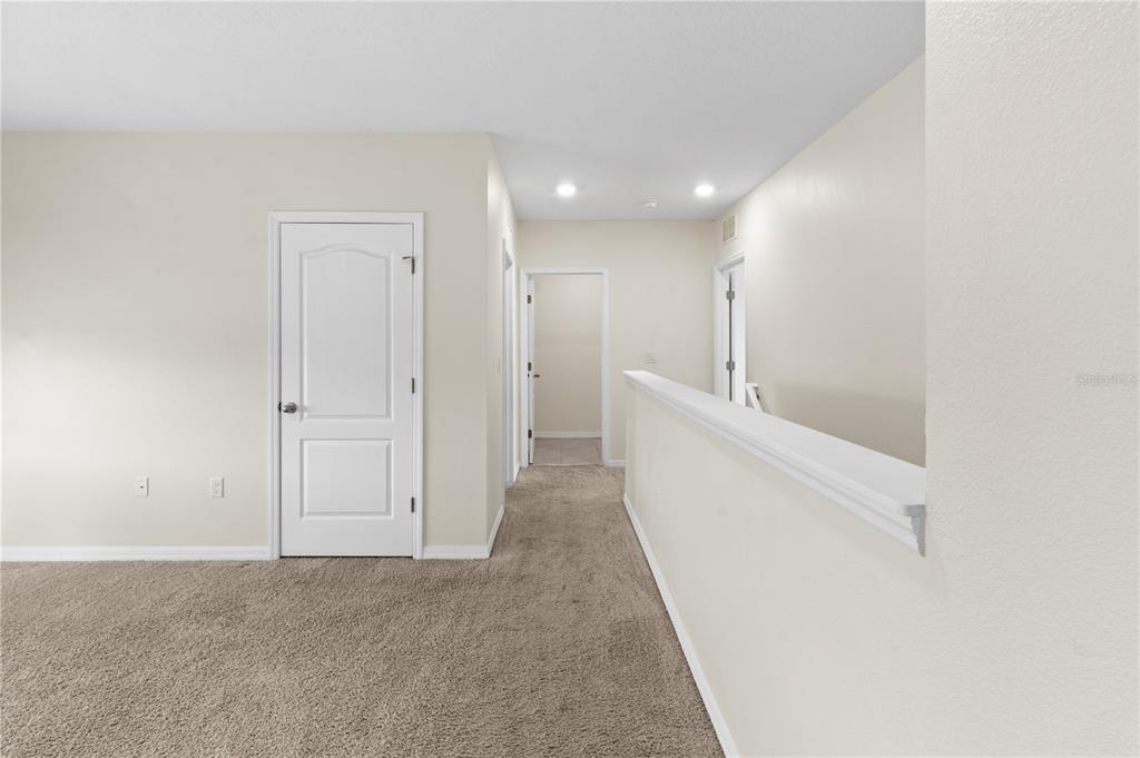 2651 Grandbury Grove Road Lakeland, FL 33811 - Photo 17 of 41 a view of an entryway with staircase