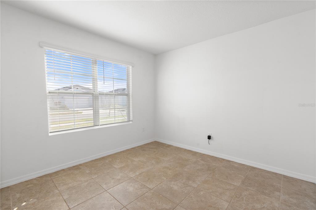 2651 Grandbury Grove Road Lakeland, FL 33811 - Photo 32 of 41 an empty room with a window