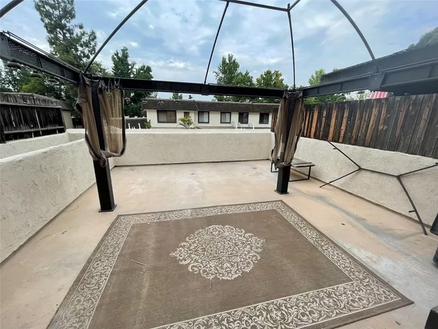 a view of a terrace with chairs