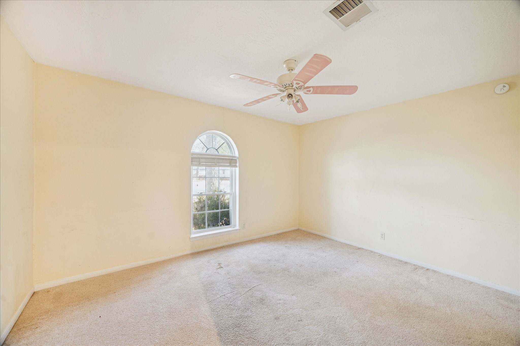 22831 Earlmist Drive Spring, TX 77373 - Photo 18 of 25 an empty room with windows and fan