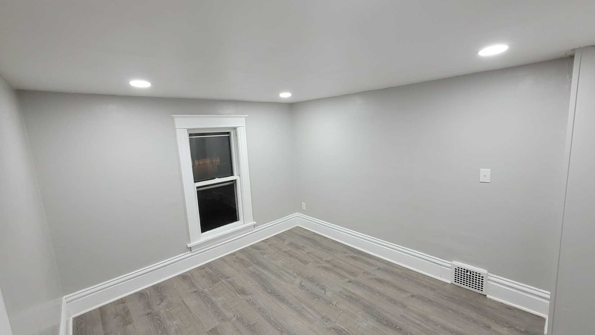 441 North View Street Aurora, IL 60506 - Photo 14 of 15 a view of an empty room with wooden floor