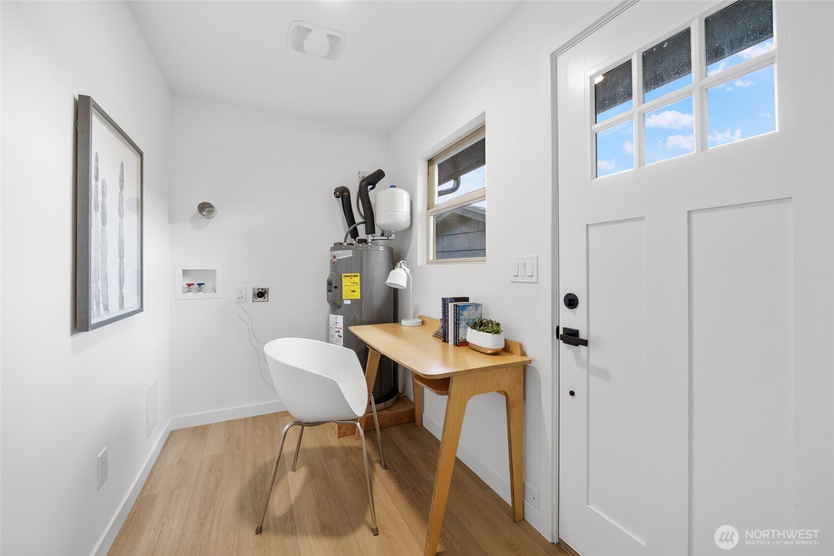 3503 Meadow Avenue North Renton, WA 98056 - Photo 16 of 29 a view of a bedroom with a table and chairs