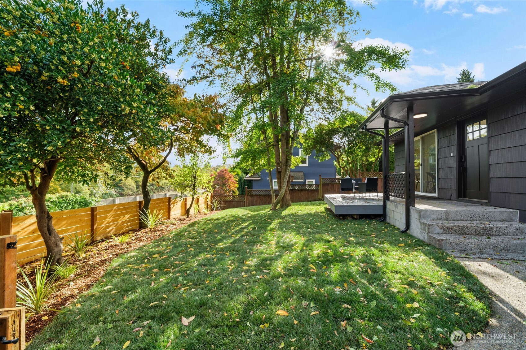 3503 Meadow Avenue North Renton, WA 98056 - Photo 29 of 29 a backyard of a house with barbeque oven table and chairs