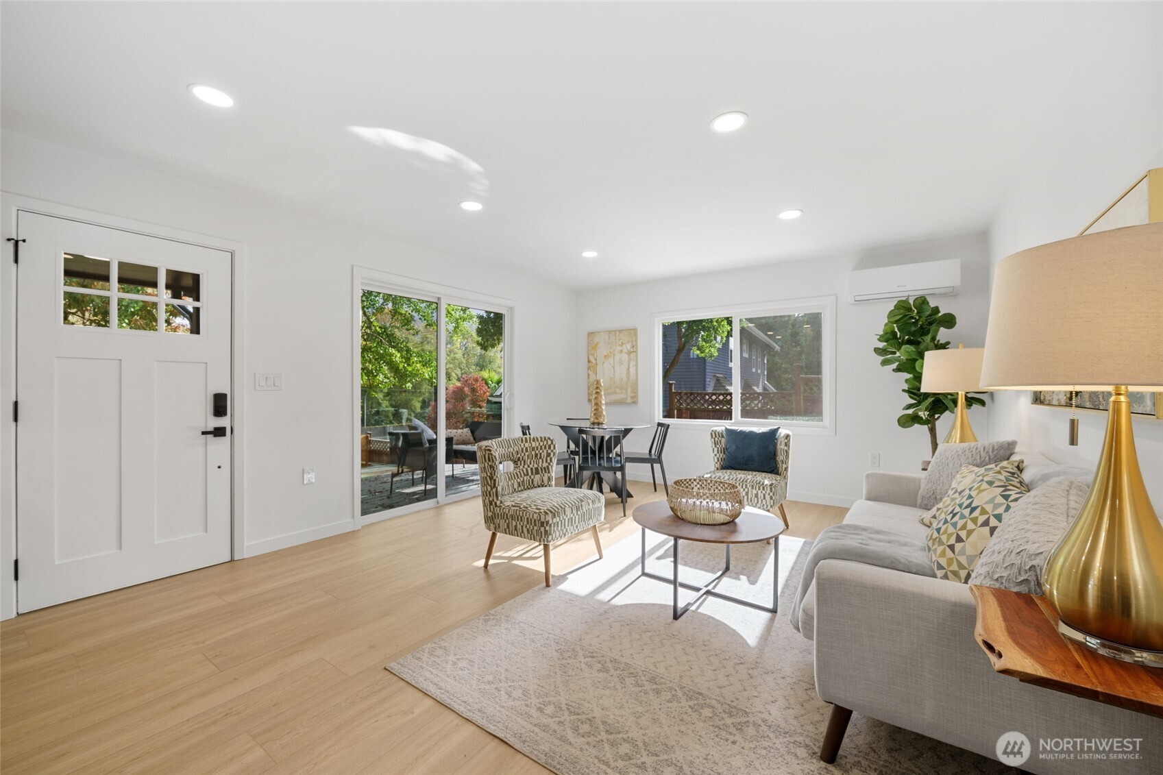 3503 Meadow Avenue North Renton, WA 98056 - Photo 7 of 29 a living room with furniture and windows