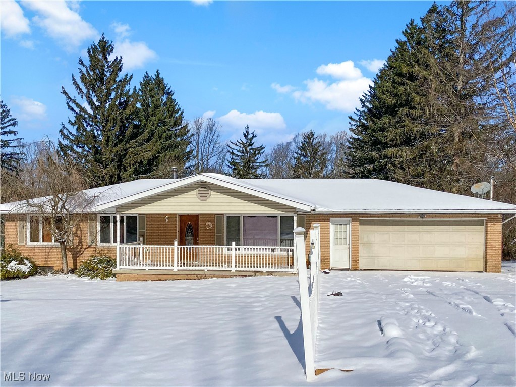 1034 Straub Road West Mansfield, OH 44904 - Photo 1 of 27 Ranch-style house with a garage