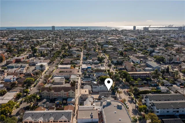 an aerial view of residential house with outdoor space and parking