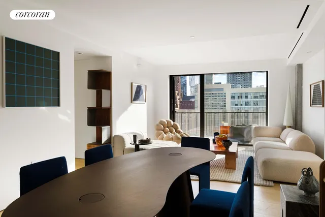 a bedroom with a bed and a potted plant