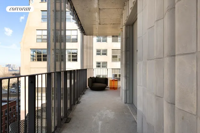 a bedroom with a bed and a view of bathroom