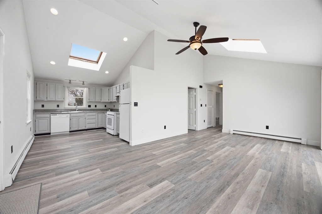 192 Swifts Beach Road Wareham, MA 02571 - Photo 20 of 38 a view of empty room with wooden floor and window
