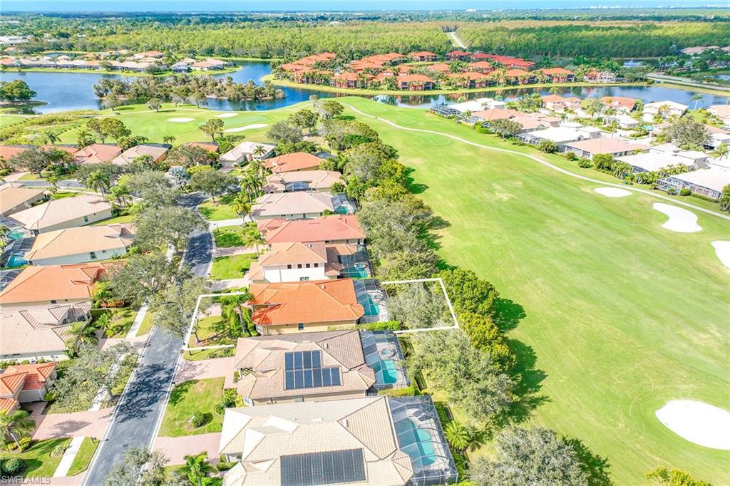 6921 Bent Grass Drive Naples, FL 34113 - Photo 3 of 48 an aerial view of residential houses with outdoor space