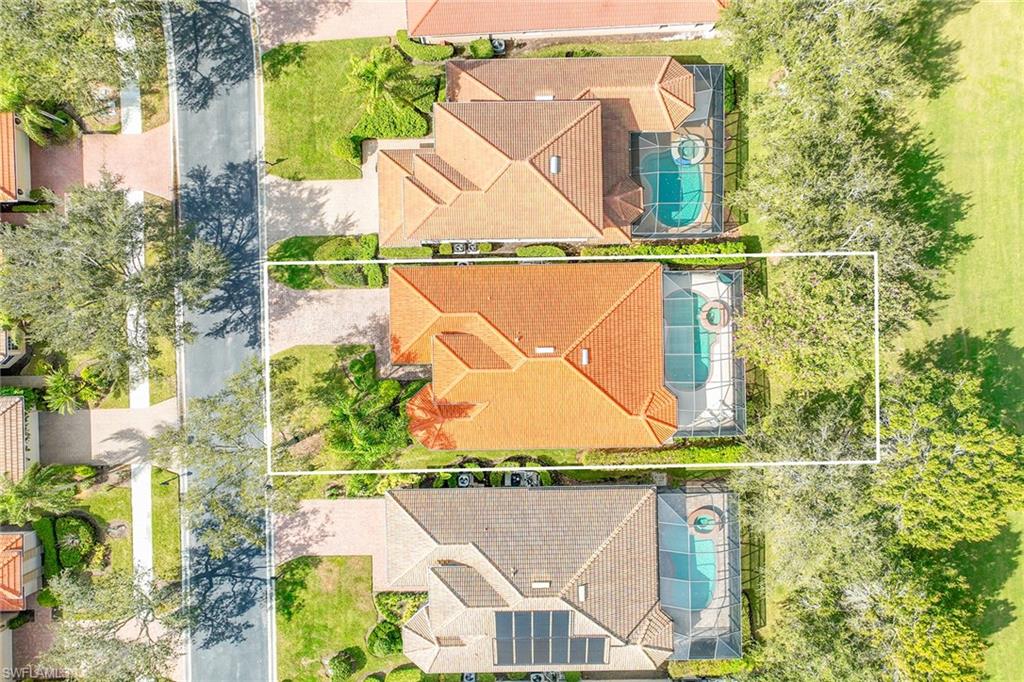 6921 Bent Grass Drive Naples, FL 34113 - Photo 32 of 48 a view of swimming pool with a balcony
