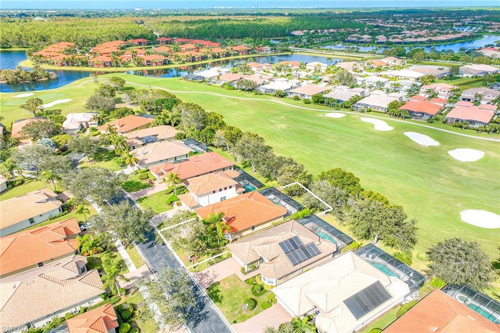 6921 Bent Grass Drive Naples, FL 34113 - Photo 40 of 48 an aerial view of residential houses with outdoor space