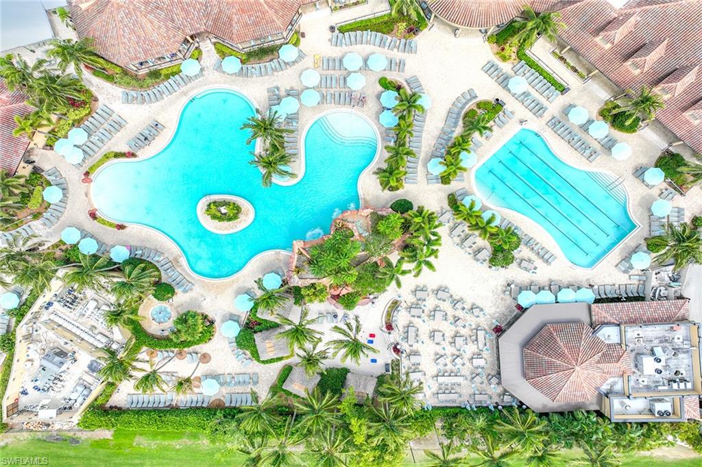 6921 Bent Grass Drive Naples, FL 34113 - Photo 43 of 48 a bathroom with a sink and garden view