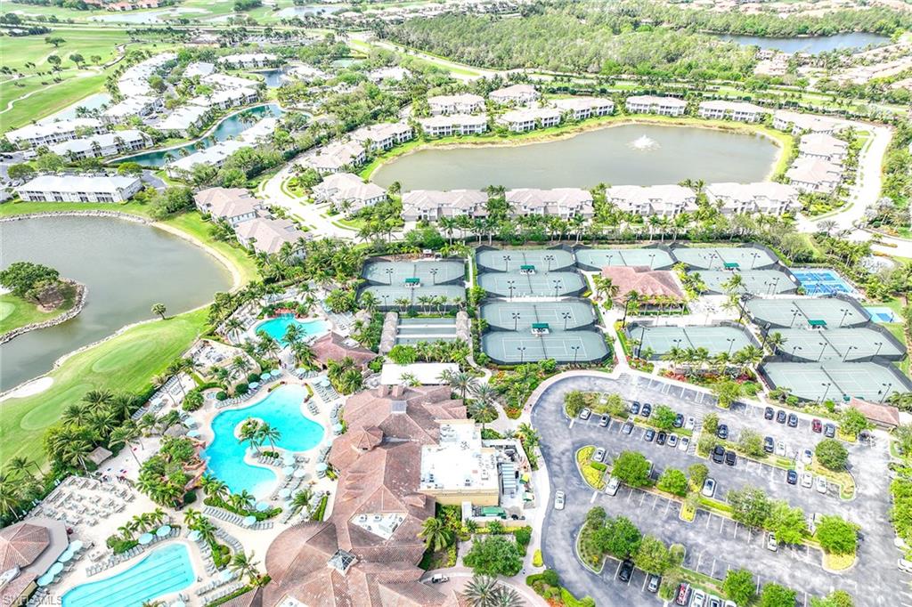 6921 Bent Grass Drive Naples, FL 34113 - Photo 45 of 48 a city view with a lake view