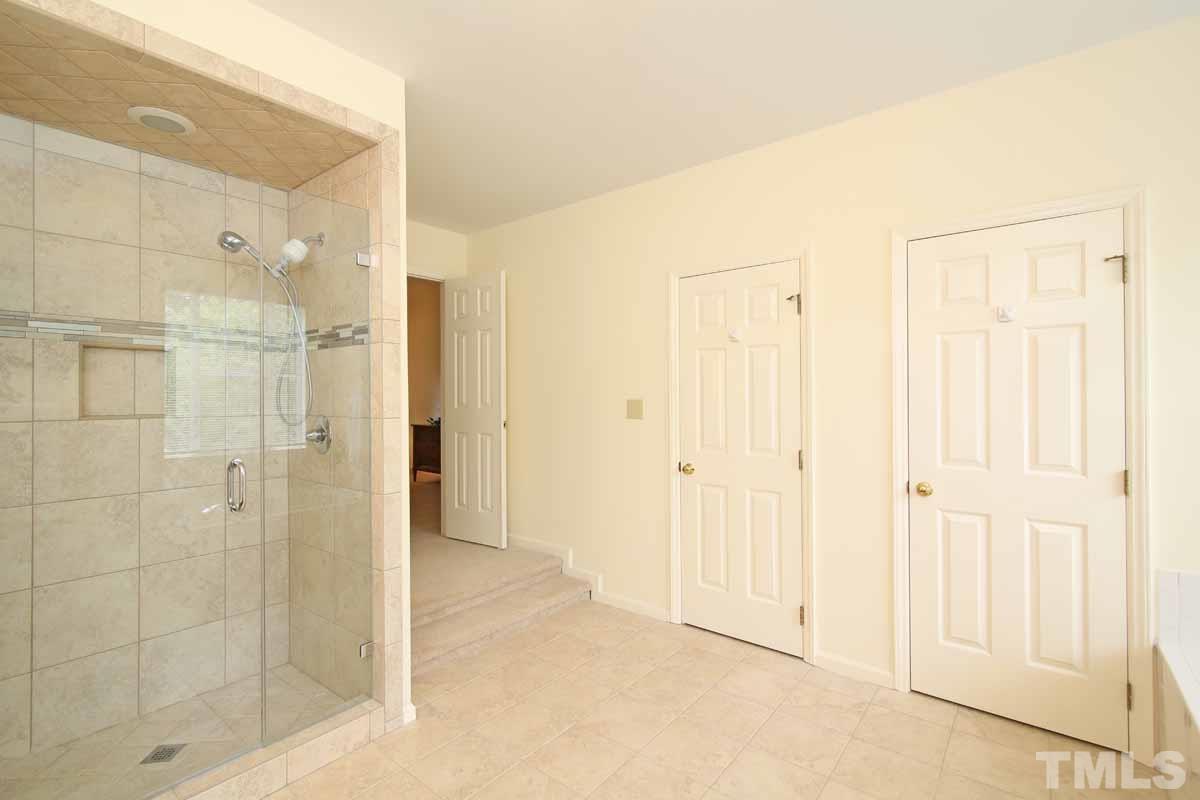 2416 Constitution Drive Raleigh, NC 27615 - Photo 18 of 25 a view of a bathroom with shower