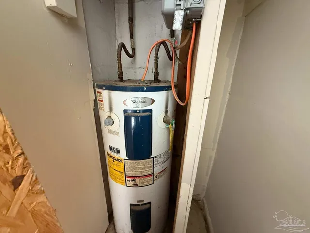 a kitchen with stainless steel appliances a stove a refrigerator sink and cabinets