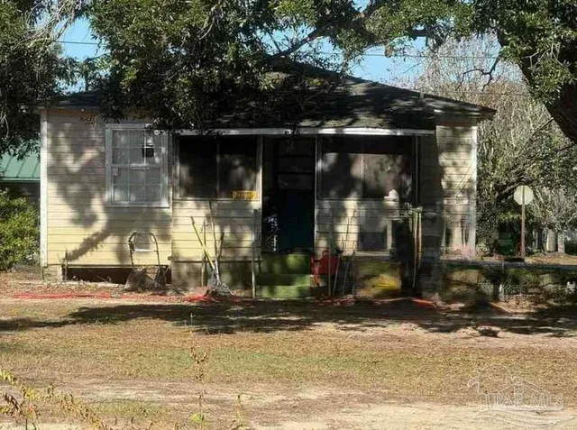 a view of granite countertop wall painting and a shelf