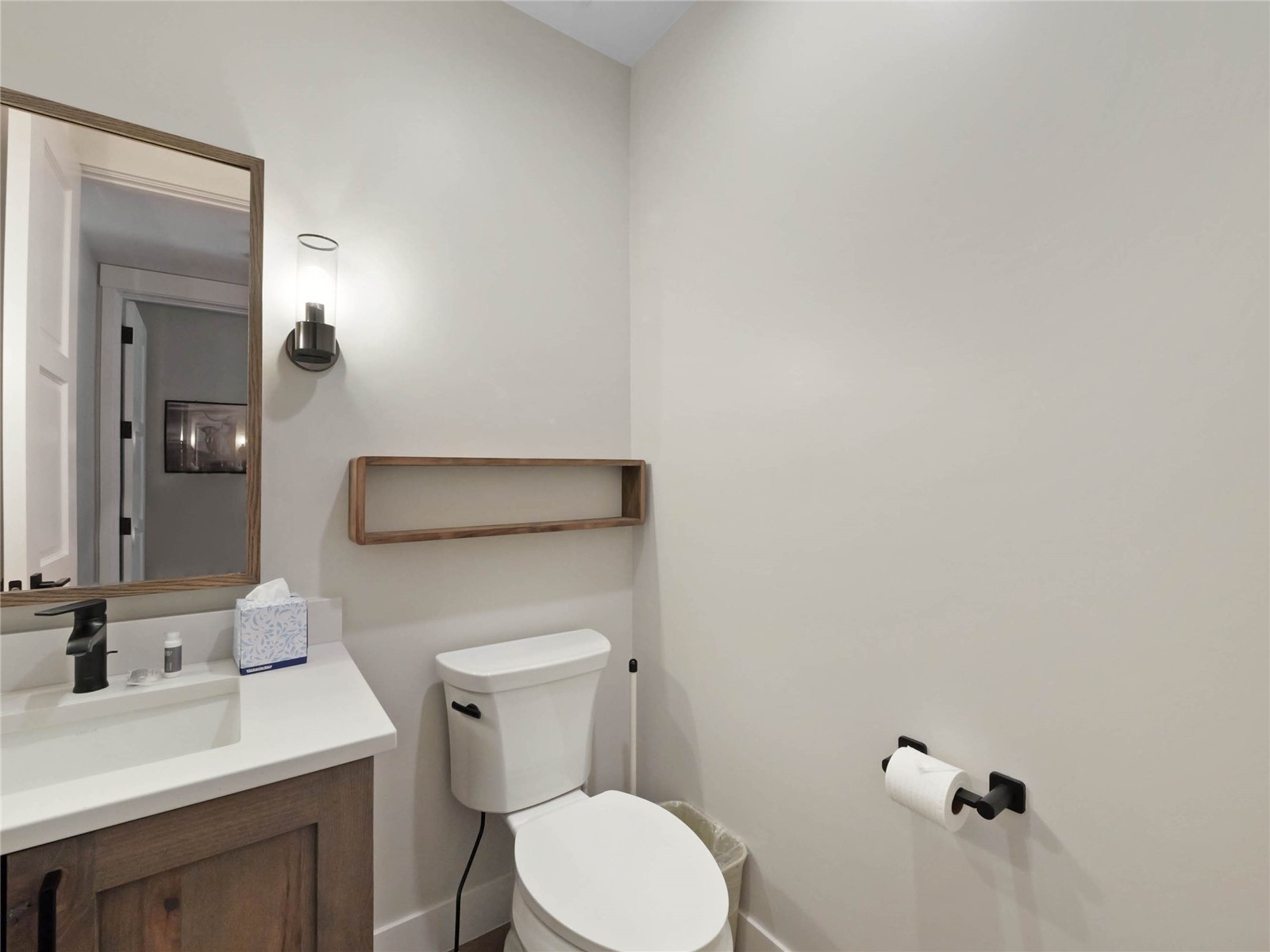 75 Alcove Court, Unit 75 Keystone, CO 80435 - Photo 31 of 40 a bathroom with a toilet a sink and mirror