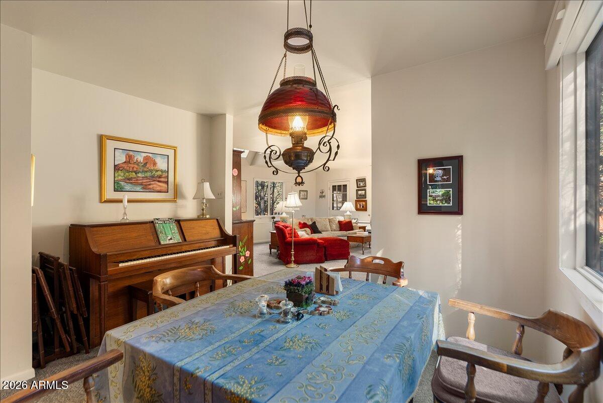 103 North Harding Drive Sedona, AZ 86336 - Photo 16 of 62 a living room with furniture and wooden floor